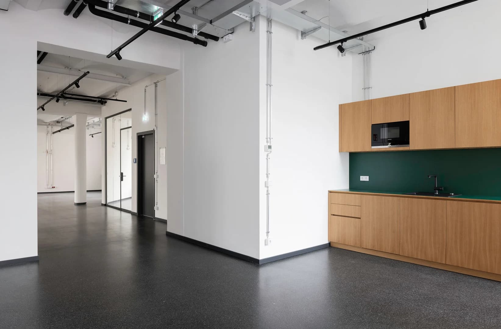 Wide view of the open office space